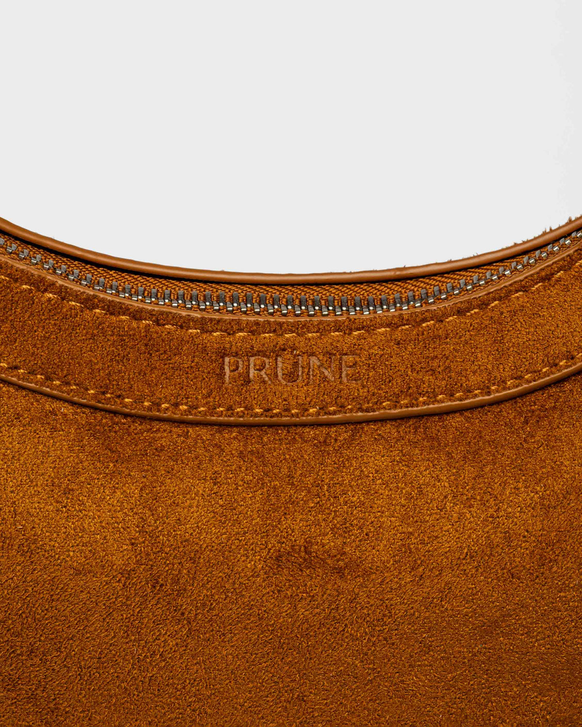 Cartera al hombro Western en efecto gamuza