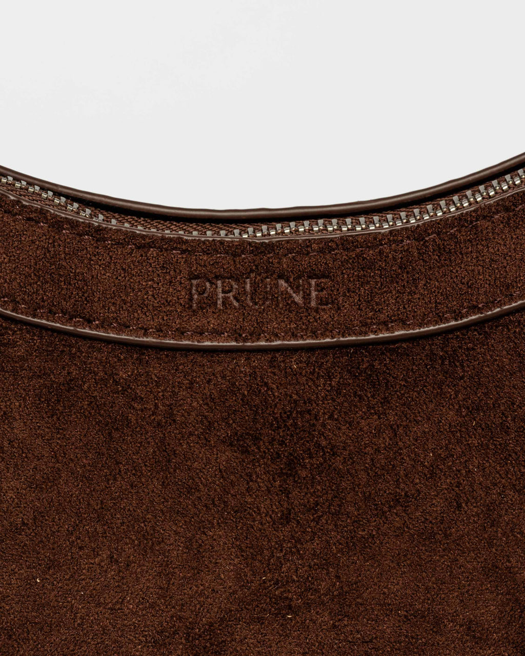 Cartera al hombro Western en efecto gamuza