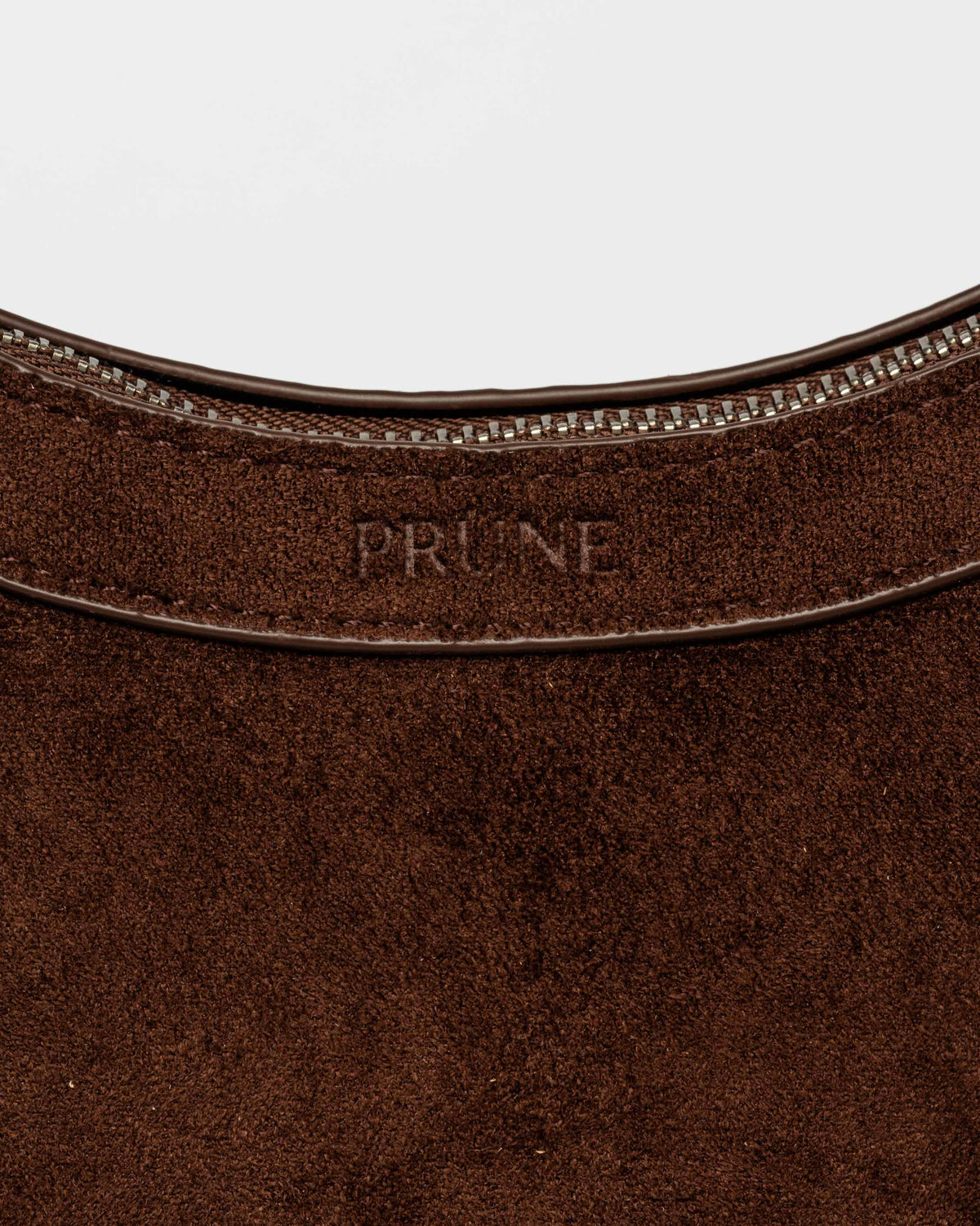 Cartera al hombro Western en efecto gamuza