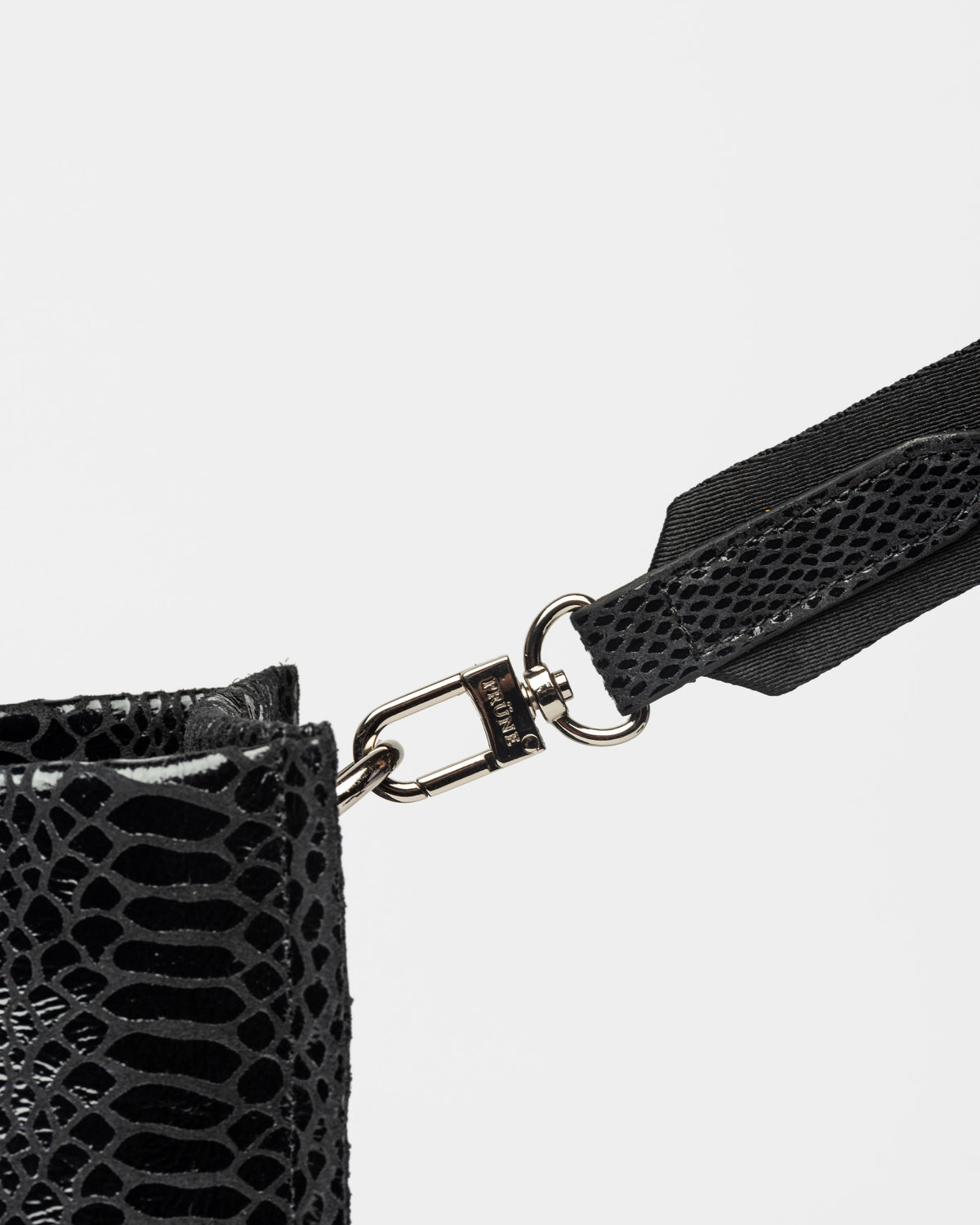 Cartera de mano Capri en cuero gamuza anaconda