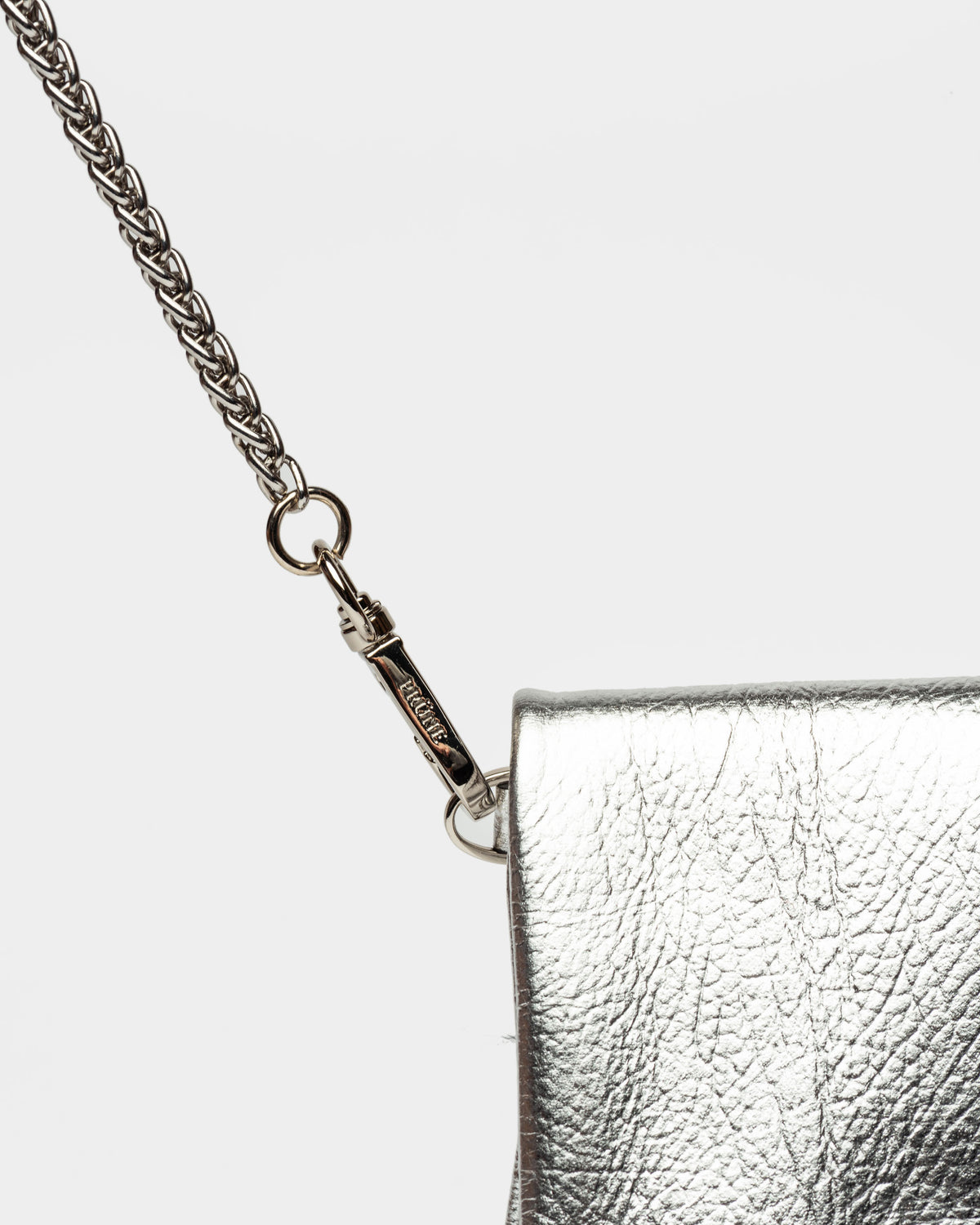 Mini bag Curve en cuero charol arrugado