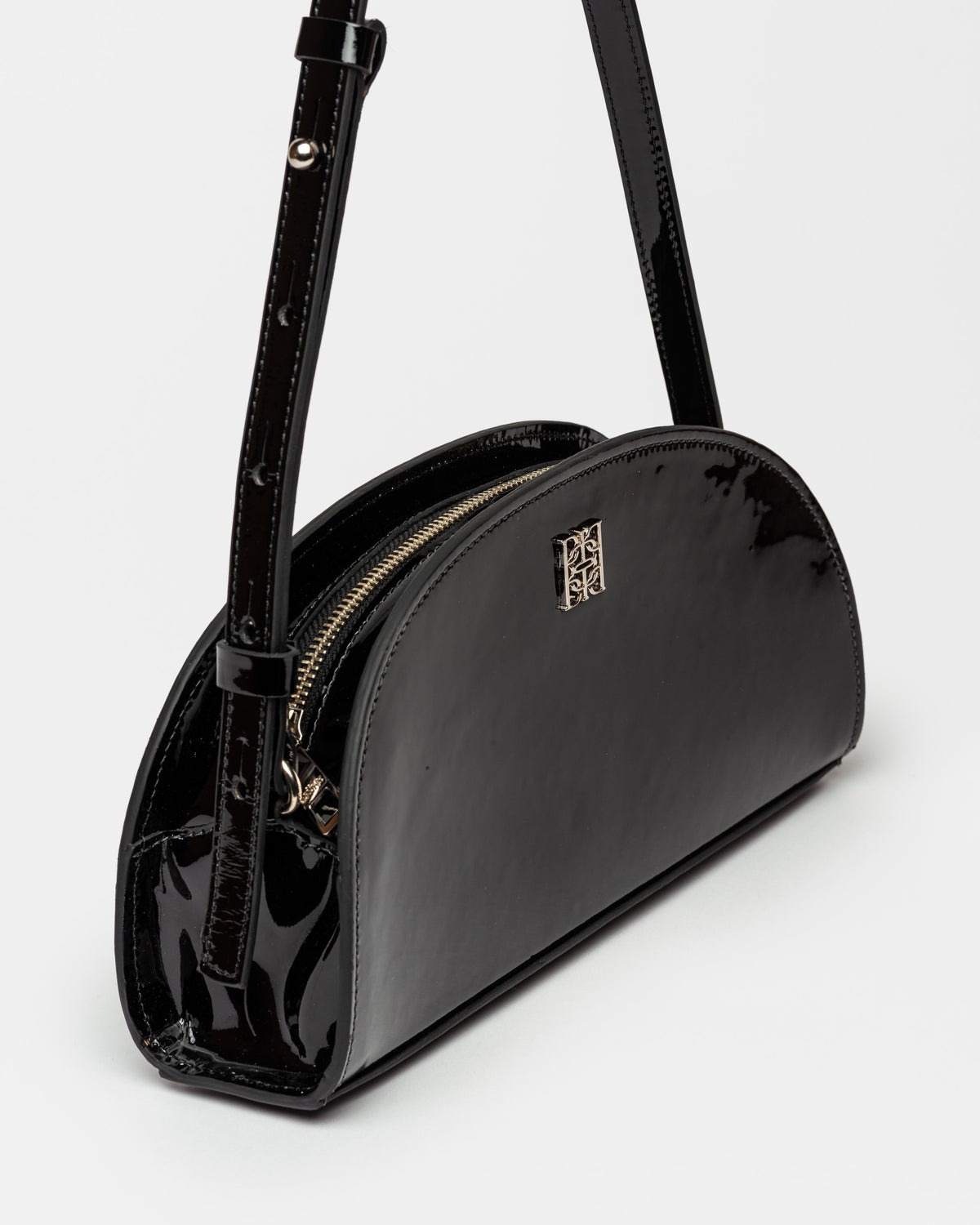 Cartera al hombro Lunette en cuero charol
